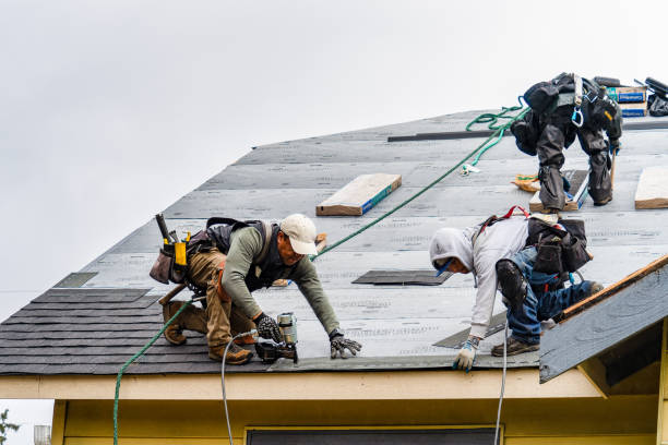 Professional Storm Damage Roof Repair technician working in White Plains, NC